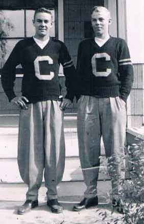 The Bjordammen Twins, Rolf and John proudly wearing their CCI sweaters (bright red with gold letter) and wearing their new drapes (25 knee, 12 cuff) in this photo from October, 1953 when the boys were in grade 12 at CCI